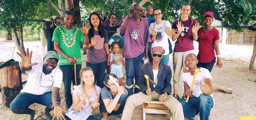 Thabiso Blak Mashaba, founder and CEO of Botswana-based social enterprise These Hands (left front) with members of the D-Lab: Development team and local community members in Kaputura.