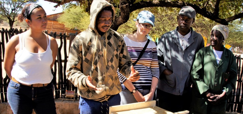 This is my multi-lingual team during our first prototype presentation. From left to right you can see me, Arthur from Kaputura where the local language is Kwe, Anna who is a grad student in the US and speaks English and Spanish, Leene, an Industrial Designer from Botswana who speaks Kalanga, English, and Setswana, and Pihelo who is an artist from Rakops and whose first language is Kalanga. Photo: Liz Hunt