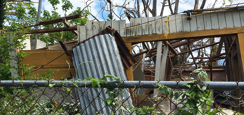 Wooden houses with thin metal roofs took a terrible beating when Hurricane Maria slammed into Puerto Rico in September. Now mold is beginning to cause a new set of problems in many dwellings. Photo by Loiza 