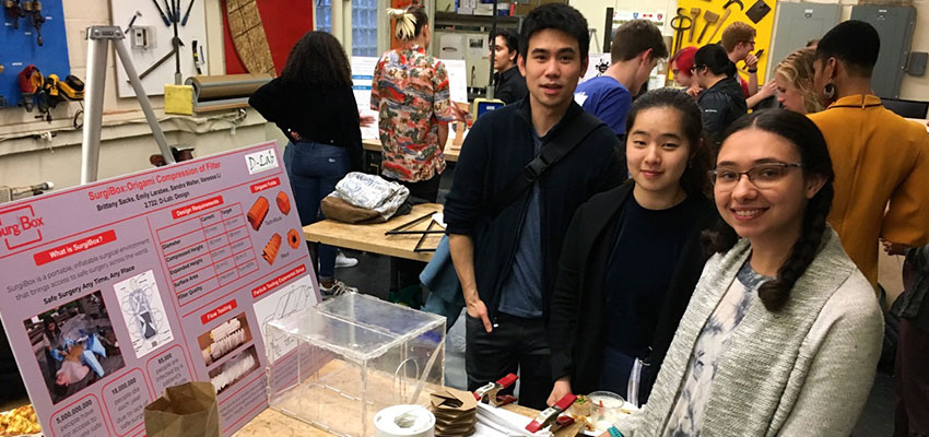 D-Lab: Design students and SurgiBox's Stephen Okajima (left) with the poster and project the students prepared.