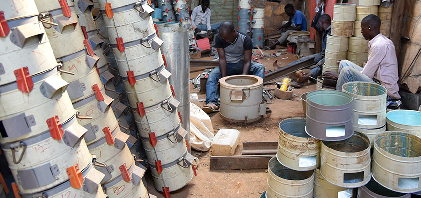 Production facility for the Makaa Stove and employees of Appropriate Energy Saving Technologies. Soroti, Uganda. 2015. Photo: Megha Hegde