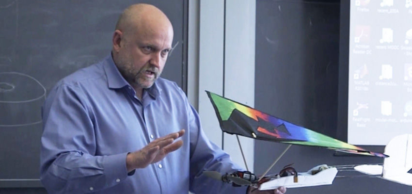 Daniel Frey, professor of mechanical engineering (and MIT D-Lab Faculty Director for Research), shows students in class 2.00a a self-designed plane he built from a kite and some foam core. Photo: Jiani Zeng