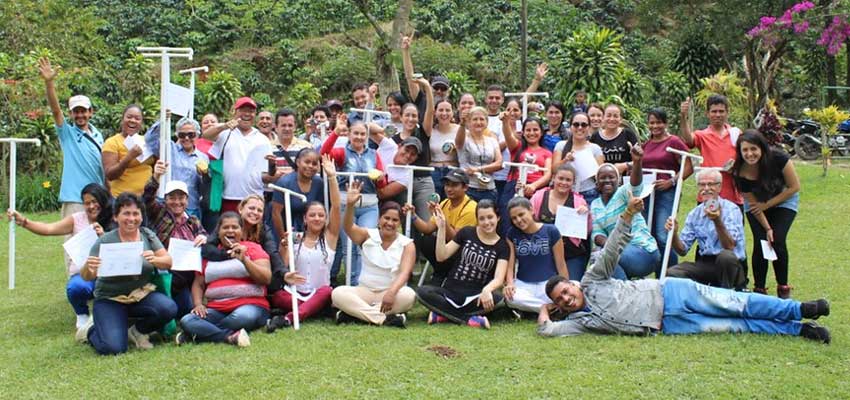 CCB ToT participants and facilitators-in-training celebrating on closing day with water-pump build-its in hand.  Photo: Sher Vogel