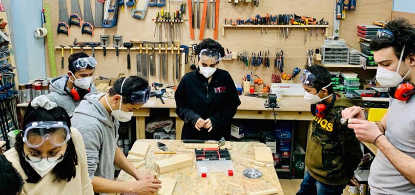 MIT D-Lab students at the Faros Horizon Center in Athens, Greece, teaching the design process through hands-on learning to refugee youth from Afghanistan, Syria, Pakistan, and Bangladesh. Photo: Faros Horizon Center 