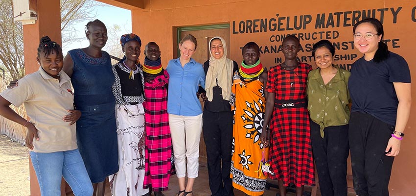 Workshop participants gathered in the Lorengelup Dispensary maternity ward for activities. From left to right: Christine Louriyen (TBI research assistant and Turkana translator), Chief Sarah Pedo, Elizabeth Eporon (mother), Rebecca Akal (mother), Acacia Leakey (TBI), Soad Mana (D-Lab), Joyce Apus (Lorengelup Dispensary worker), Alice Kosiyae (mother), Ipshita Karmakar (D-Lab), and Shulammite Lim (D-Lab). Photo: Courtesy MIT D-Lab