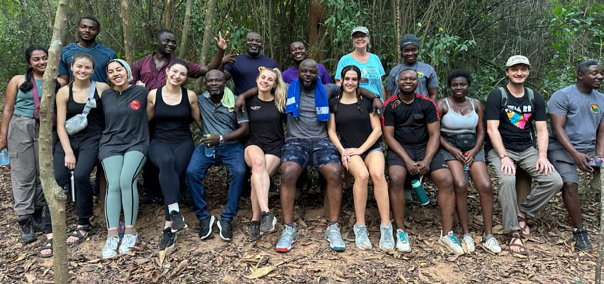 MIT D-Lab students from the fall 2023 D-Lab classes Humanitarian Innovation and Applications of Energy in Global Development workng with community partners in Ghana on converting invasive Water Hyacinth to charcoal. January 2024. Photo: Courtesy MIT D-Lab