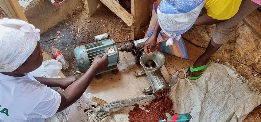 Ayirkasa women testing the shea nut mill produced by the students. Photo: Caroline Morris