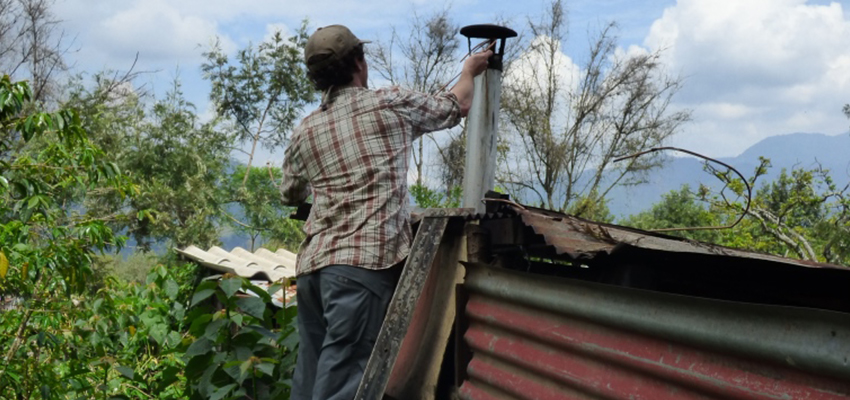 Dan Sweeny measuring stove emissions.