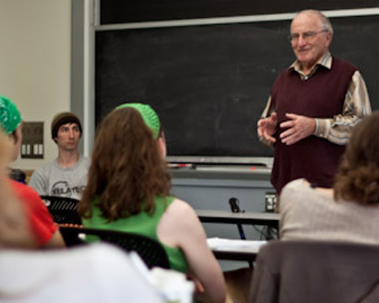 Paul Polak speaking in class