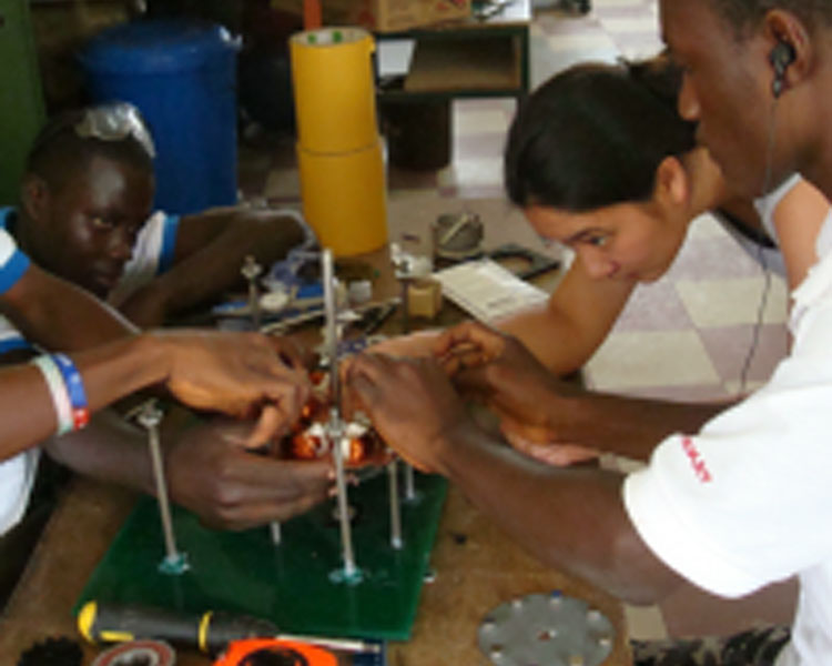 Heather Beem, founder and CEO of the Practical Education Network (right) at the TTI Fab Lab in 2011.