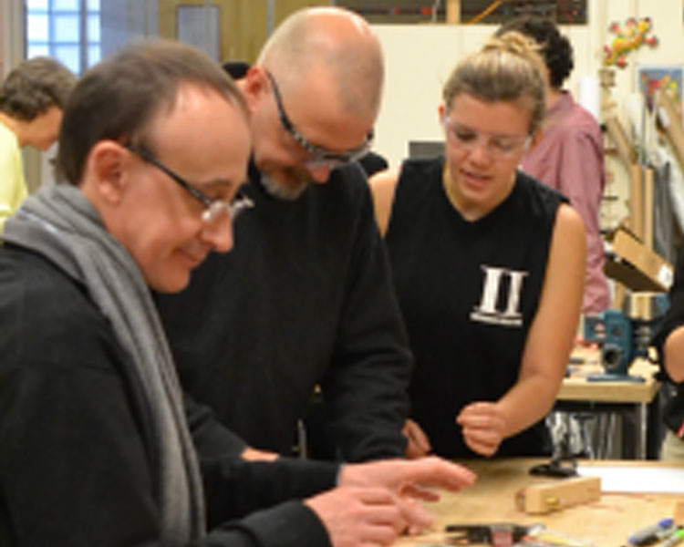 Thierry Delepoulle (Danone) and Michael Moscherosch (Johnson & Johnson) build a hot wire cutter with D-Lab student Rachael Aptowitz.