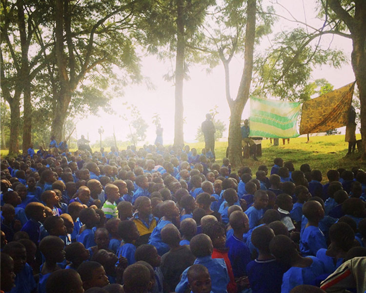 Kasiisi teams pitching their social entrepreneurship projects to the school assembly