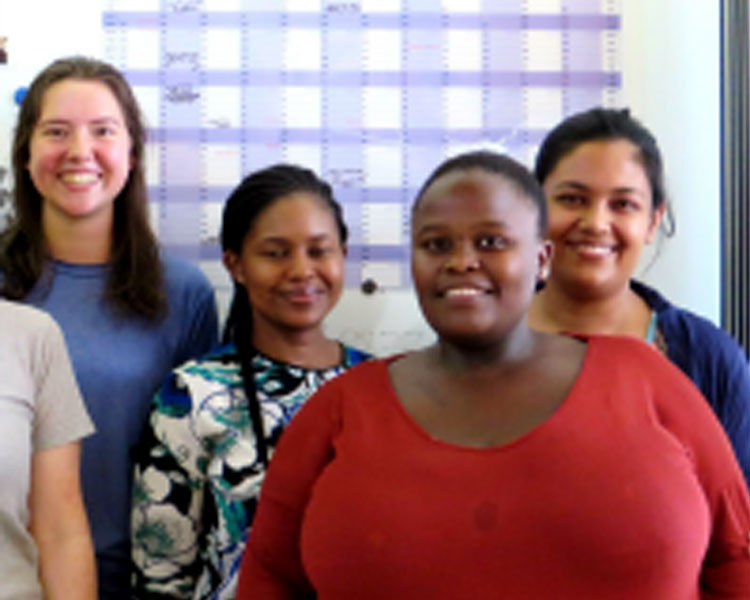 Left to right: Emma Castaños and three AeT staff members.