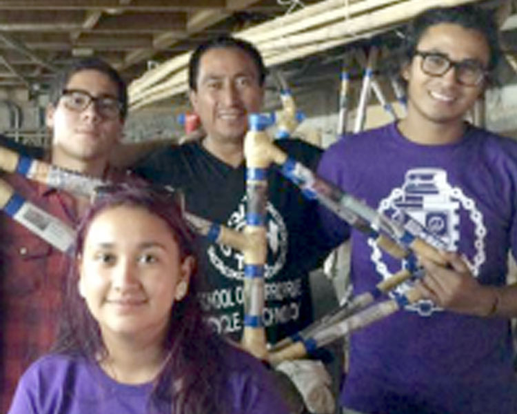 Ta Corrales Sanchez '16 and SAB graduate (foreground) with Carlos Marroquin (center back) and colleagues in Costa Rica.