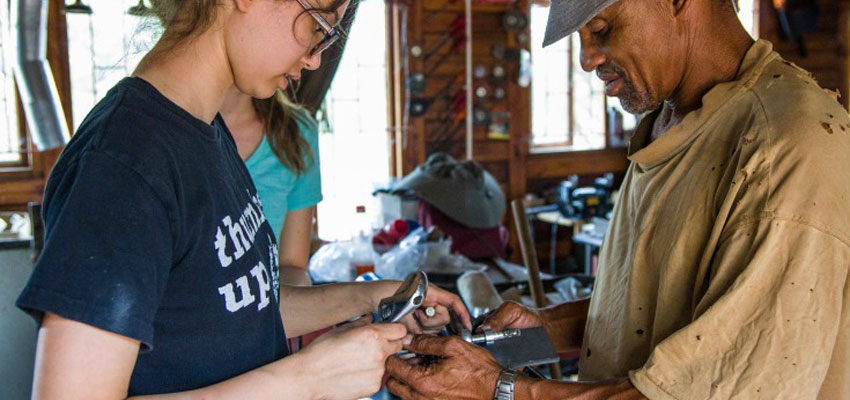 Caroline ‘20 working on assembling a drill chuck with Nico. 