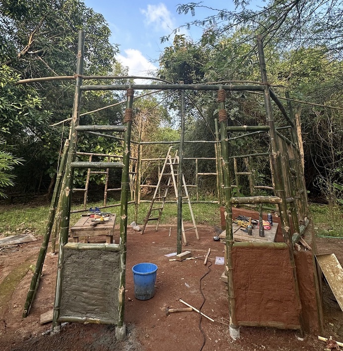 Two types of mud on a woven bamboo wall structure.