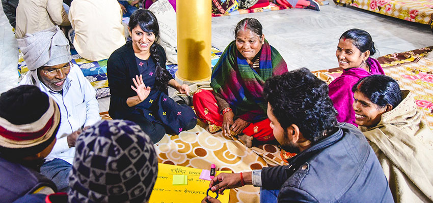 Our trip leader, Megha, discussing ideas with participants.